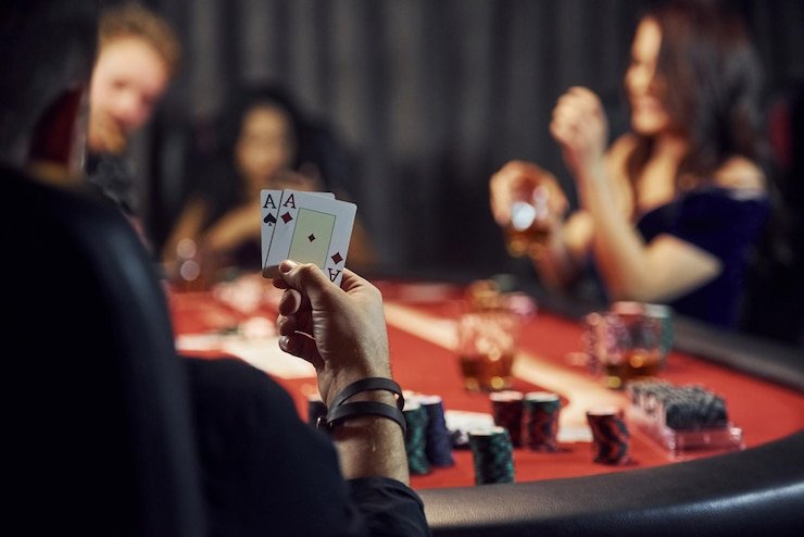 pokebet homepage hero showing mobile sports betting and casino games